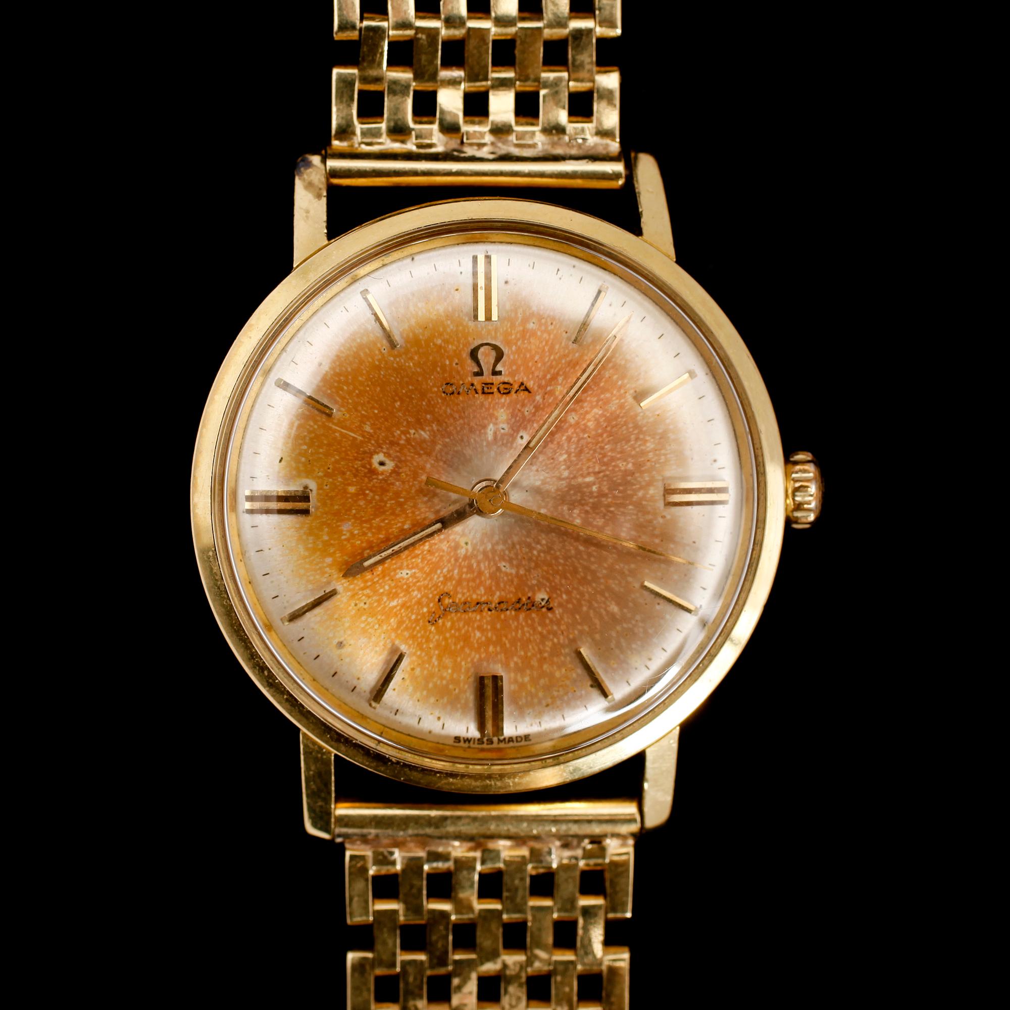 ARMBANDSUR, 18 k guld, Omega Seamaster, 1976. Total vikt med urverk ca 70 gram.