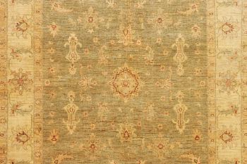An Ushak rug, c. 244 x 167 cm.