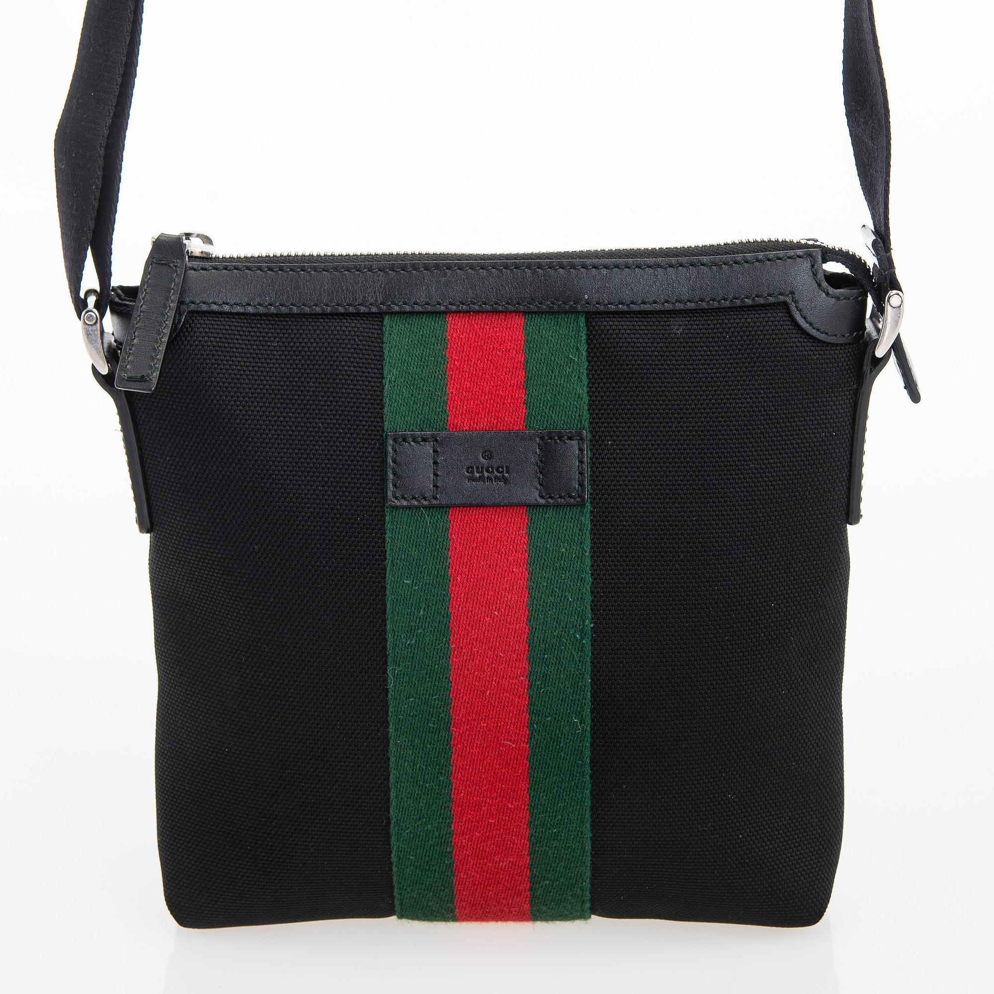 Gucci, a "Techno Canvas Web Messenger" bag.