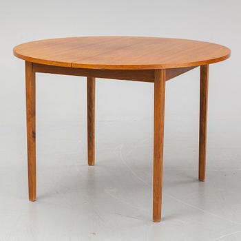 A teak veneered table, second half of the 20th century.