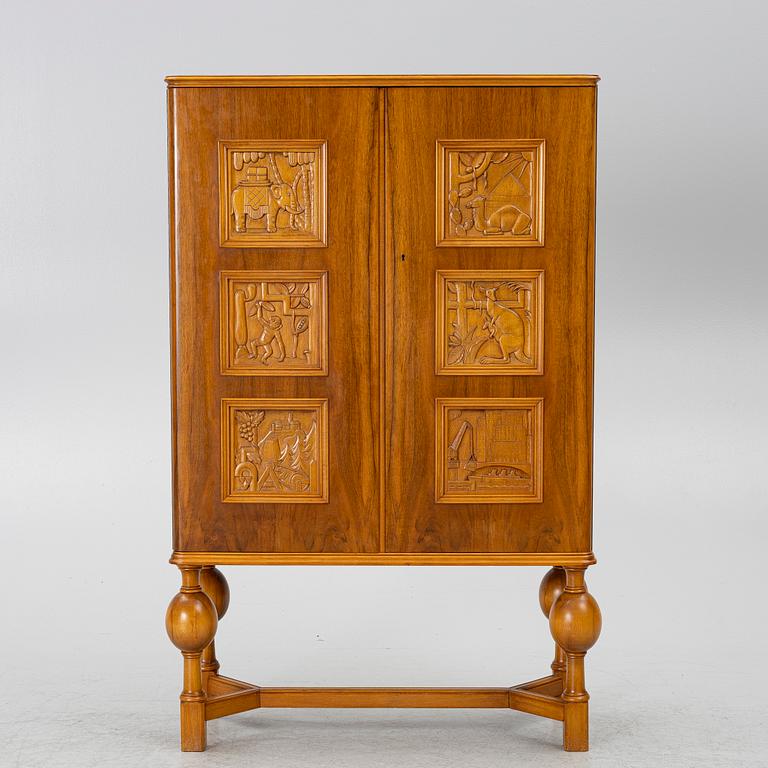 Eugen Höglund, a walnut cabinet, executed in his workshop in Vetlanda, Sweden 1950s.