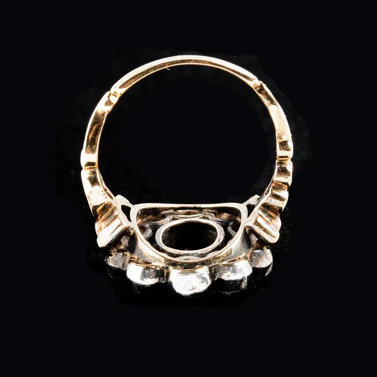 RING, 18k guld och silver, rosenslipade diamanter och ovalslipad rubin, 1925.