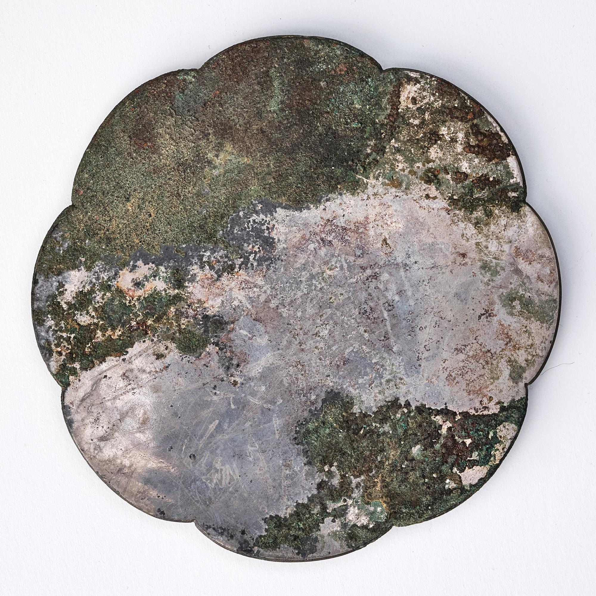 Spegel, delvis försilvrad brons. Tangdynastin (618-907).