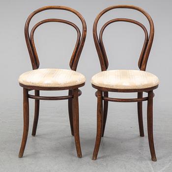 A pair of german chairs, early 20th century. Signed with labels.