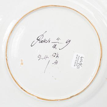 Two Swedish faiance plates, Marieberg and Rörstrand, 1769 and 1770.
