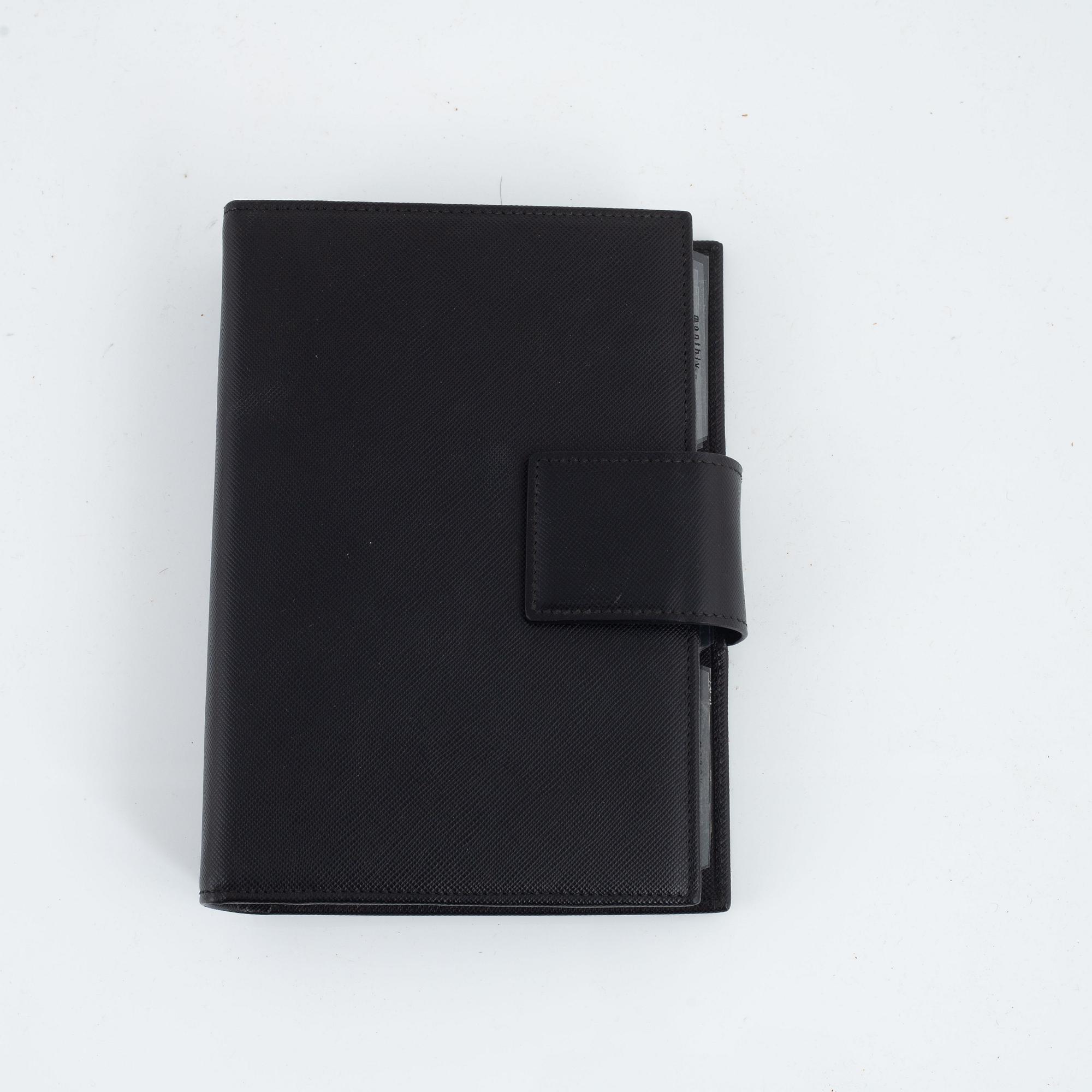 Prada, agenda.