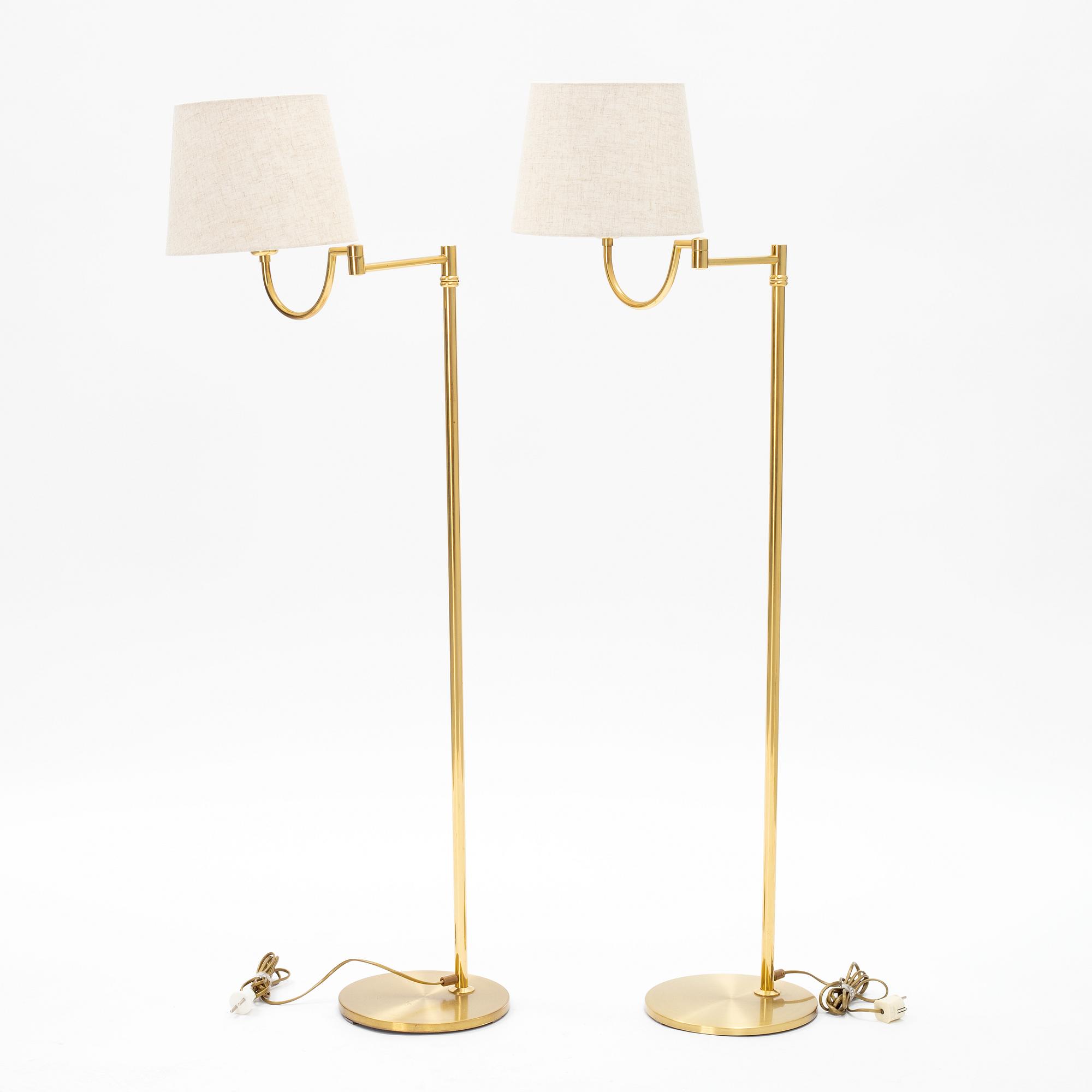 A pair of brass floor lamps EWÅ, Sweden, later part of the 20th century.