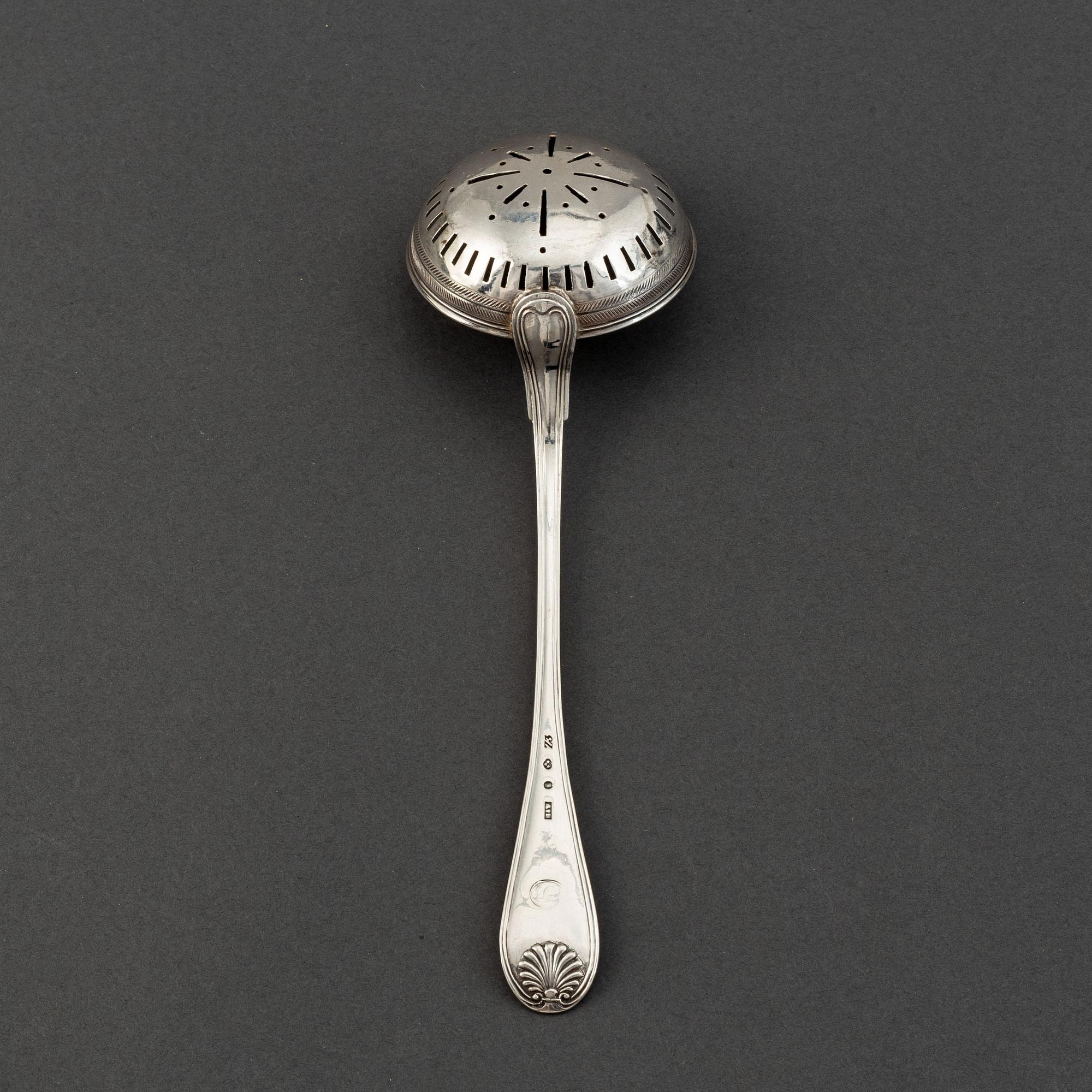 A Swedish 19th century silver caster-spoon, mark of AJ Björkman, Stockholm 1830.