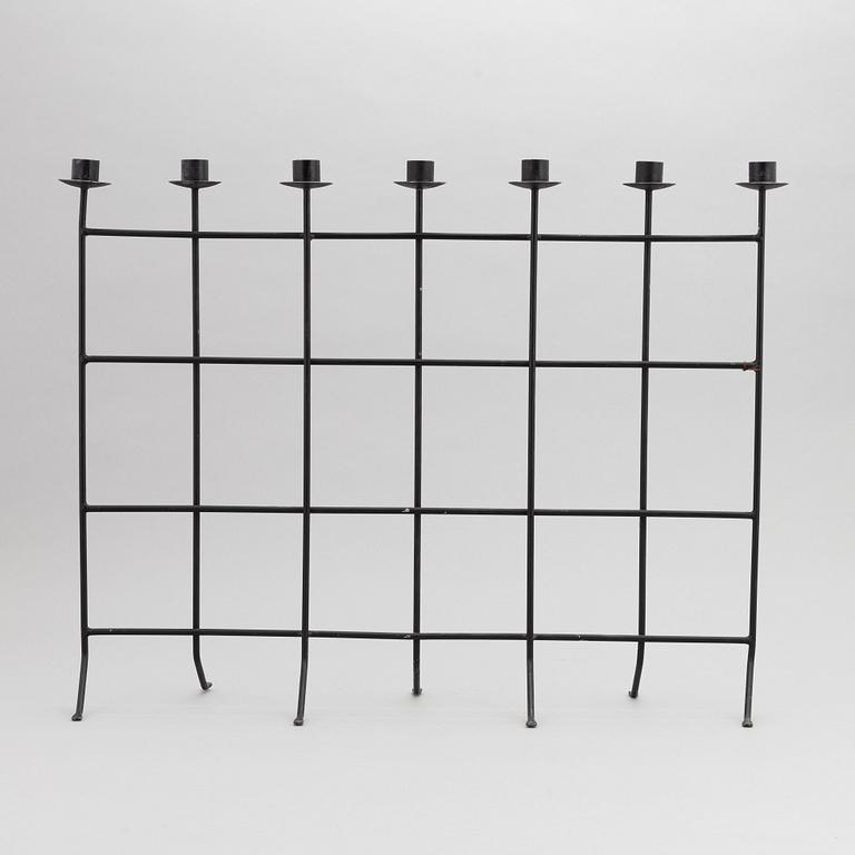 An iron candlestick, second half of the 20th Century.