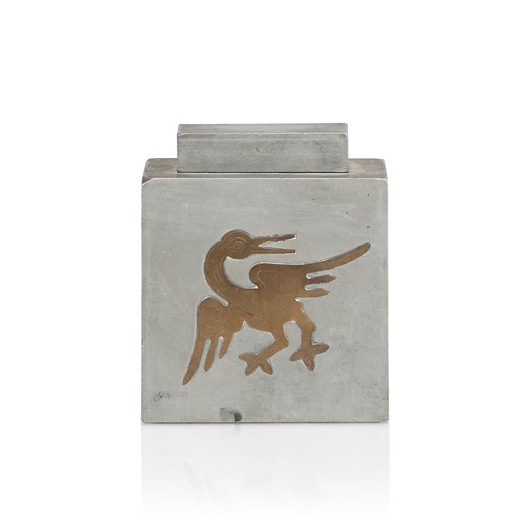 Firma Svenskt Tenn, a pewter lidded cannister with brass decor, Stockholm 1929.