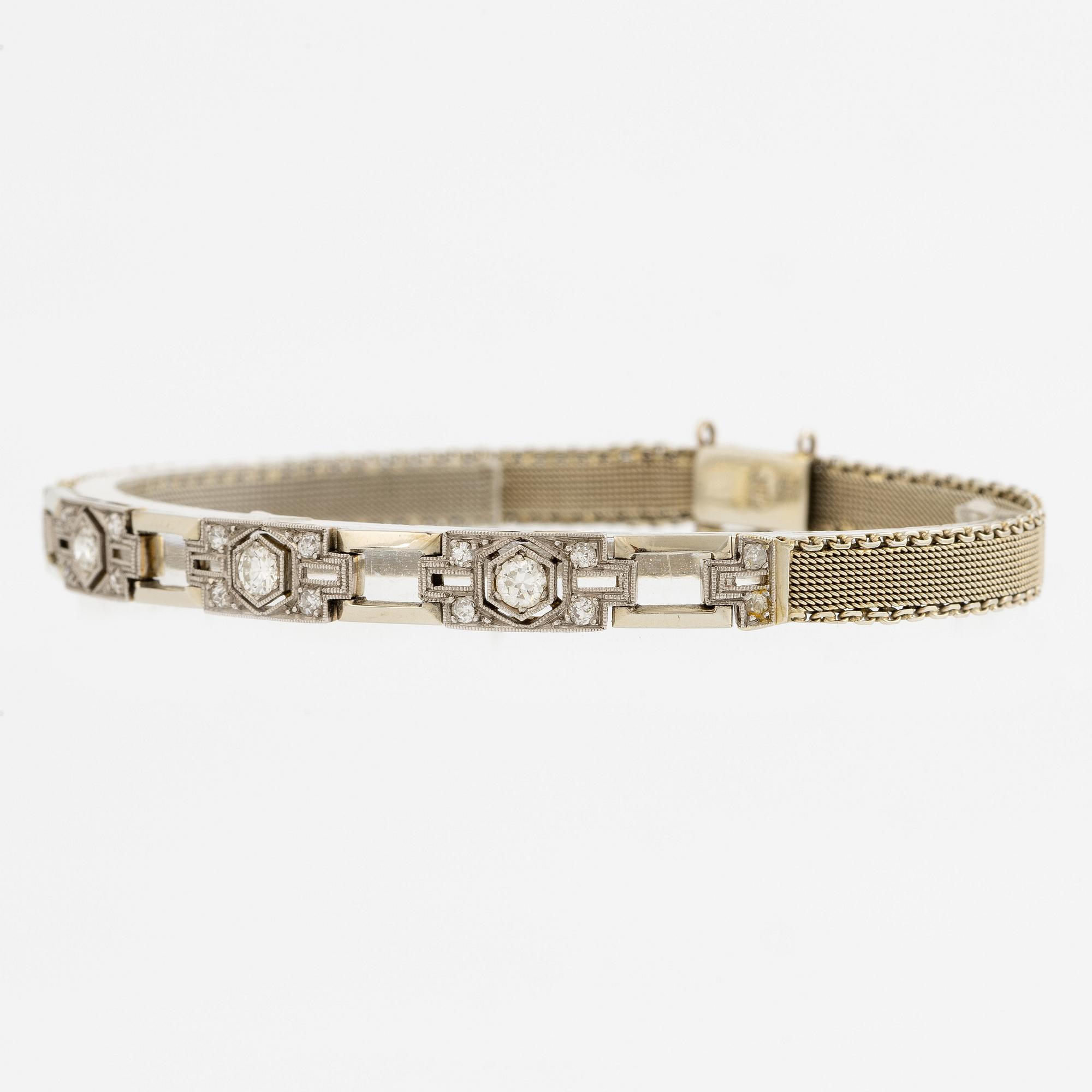 Arm bracelet, 18K white gold with brilliant-cut diamonds, old cut and octagonal-cut diamonds.
