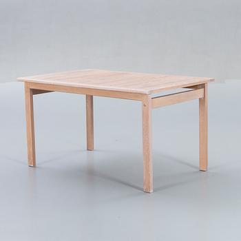 A Danish 1960s dining table and 6 chairs,