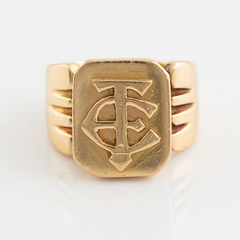 18K gold monograme ring.