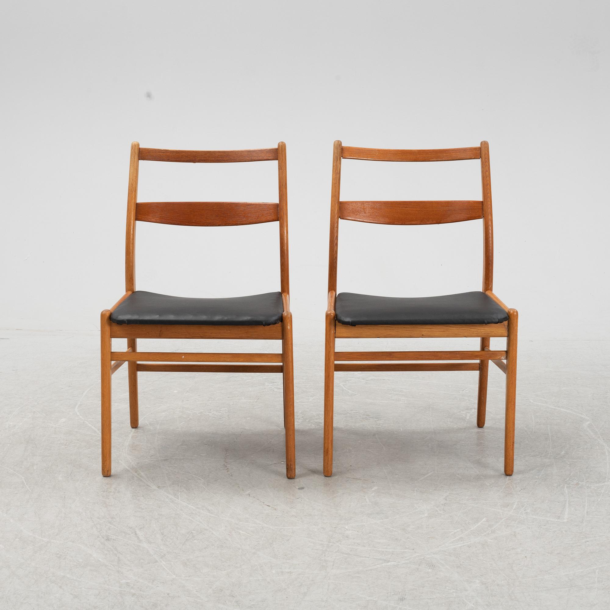 A five-piece teak and oak dining suite, second half of the 20th Century.