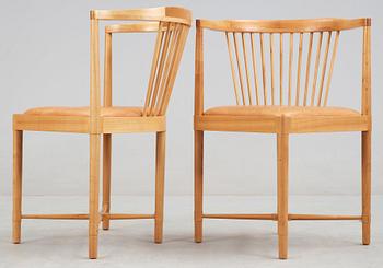Børge Mogensen, A pair of Børge Mogensen 'Ruder Konge' cherry and beige leather chairs, Søborg Møbelfabrik, Denmark.