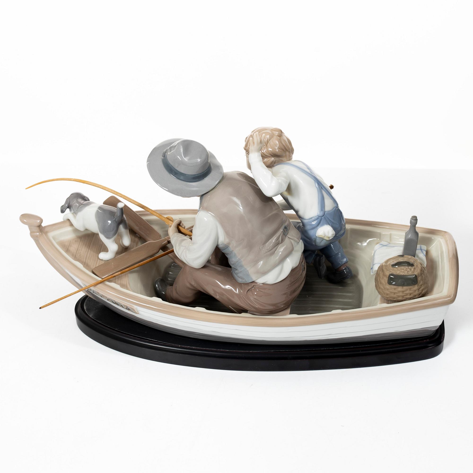 Salvador Furió, figurine, "A fishing lesson", and "A father's pride", Lladró, Spain.