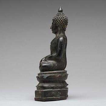 A bronze sculpture of a seated buddha, Thailand, presumably Lanna, 18th Century.