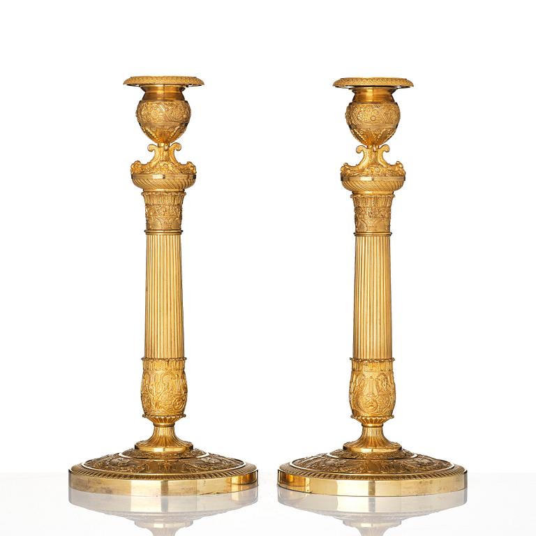 A pair of French Empire candlesticks, early 19th century.