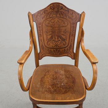 AN ART NOVEAU ARMCHAIR. Signed with label, Jacob & Josef Kohn, Wien.