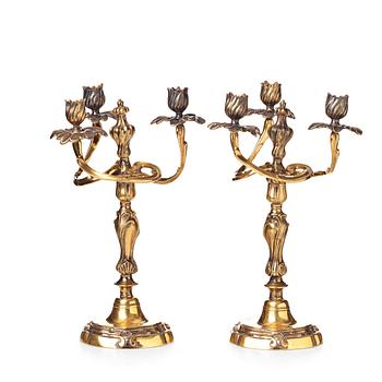 100. A pair of Louis XV three-light candelabra, mid 1700's.