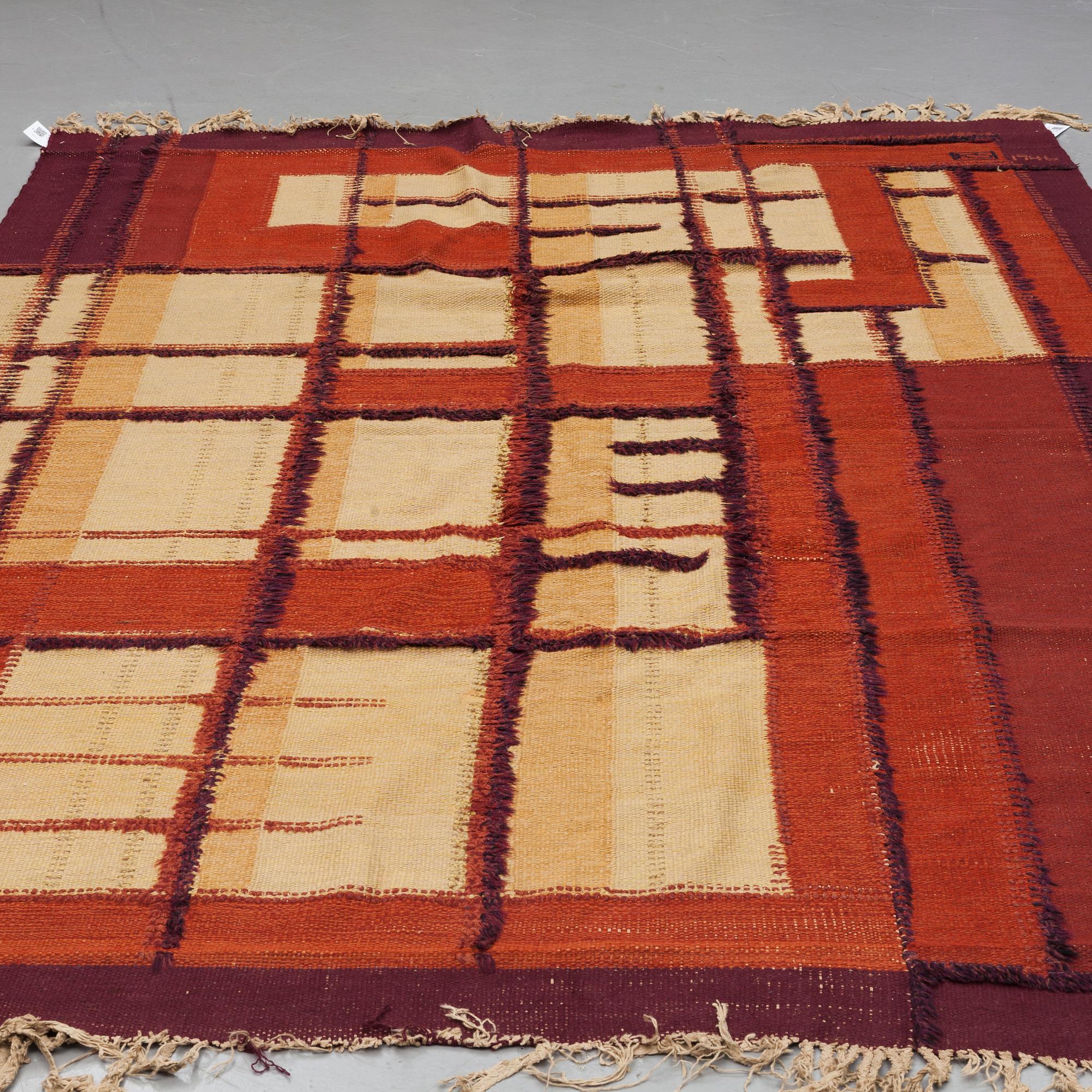 A CARPET, knotted pile in relief and flat weave, ca 306,5 x 205 cm, signed KS 1946, Sweden, probably Scania.
