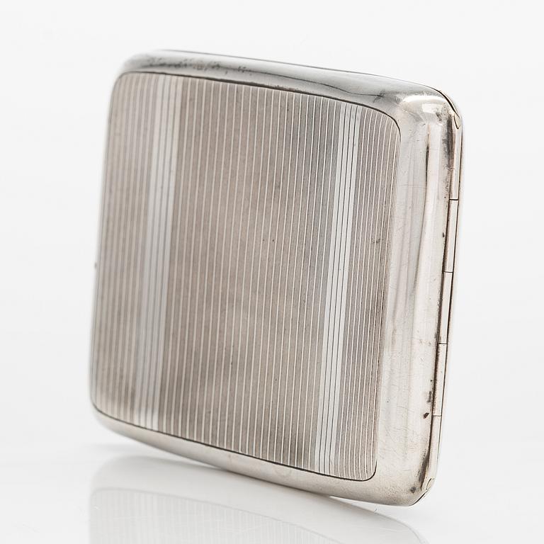 An Art deco sterling silver cigarette case, Sheffield 1929.