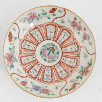 A pair of Chinese famille rose porcelain covers, and three saucers, late Qing dynasty, 19th century.