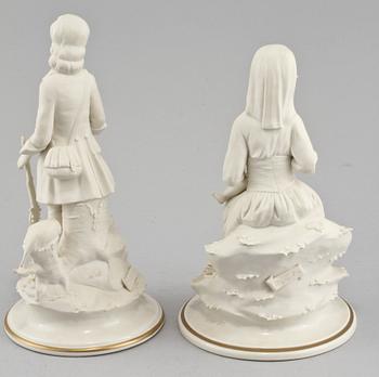 FIGURINER, ett par, parian och porslin, Neapelliknande märken, 1900-talets början.