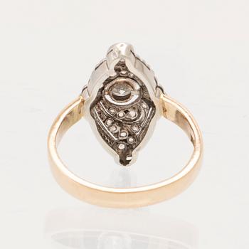 An Art Deco ring in 18K white and red gold set with rose-cut and old-cut diamonds.