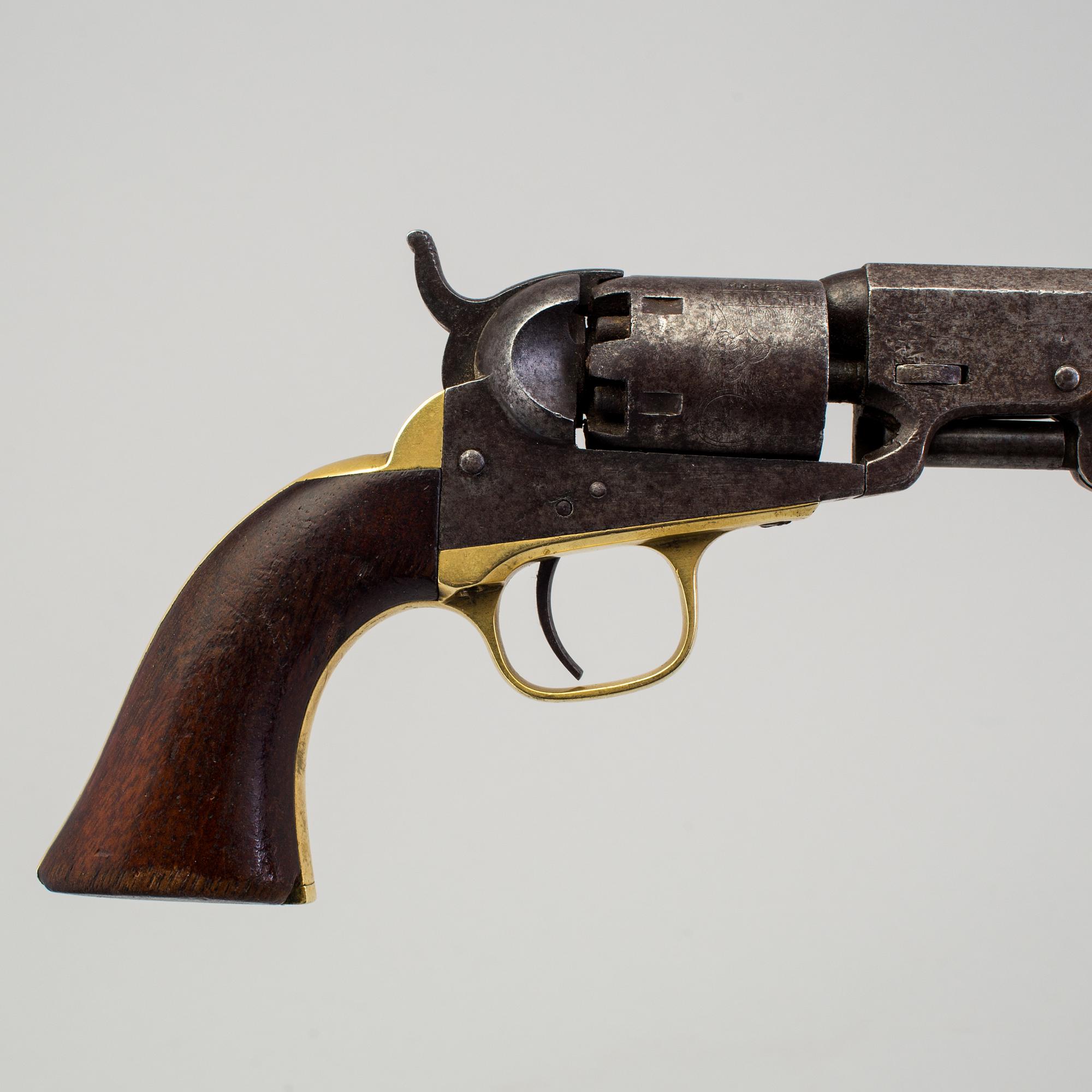 A Colt percussion revolver mid 19th century.