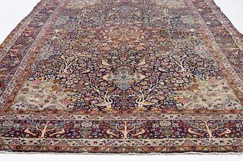 A carpet, Antique/semi-antique Kerman, ca 340 x 220 cm.
