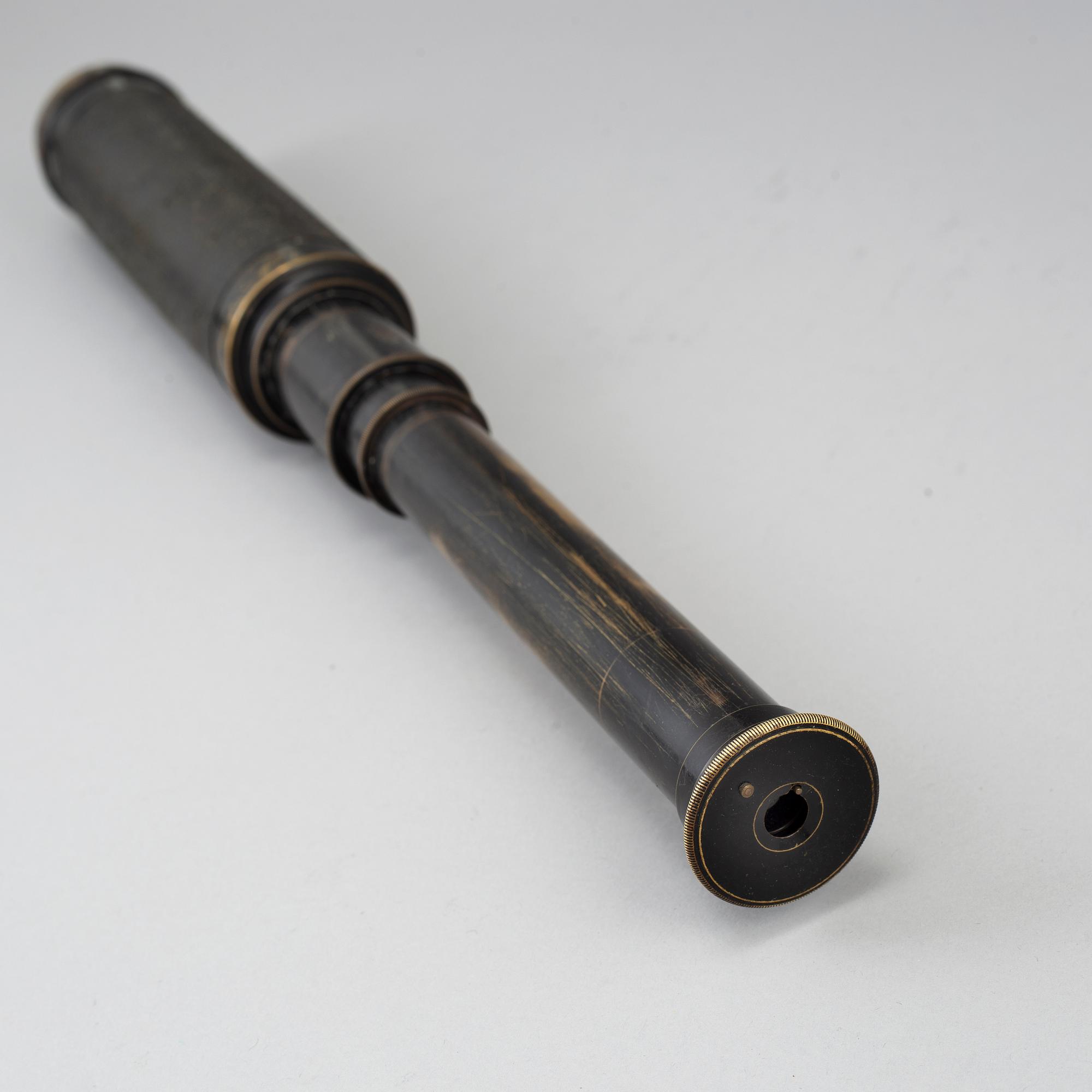 A telescope, circa 1900.