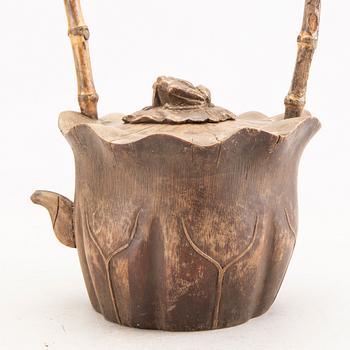 A Chinese early 1900s bamboo tea pot.