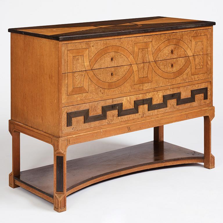 Carl Bergsten, an oak veneered sideboard/ chest of drawers, Nordiska Kompaniet Sweden 1923. Part of a set exhibited in Gothenburg 1923.