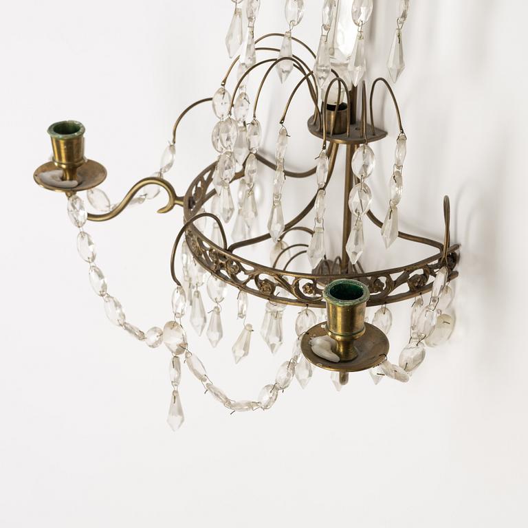 A pair of Gustavian style two-branch wall lights, 20th century.