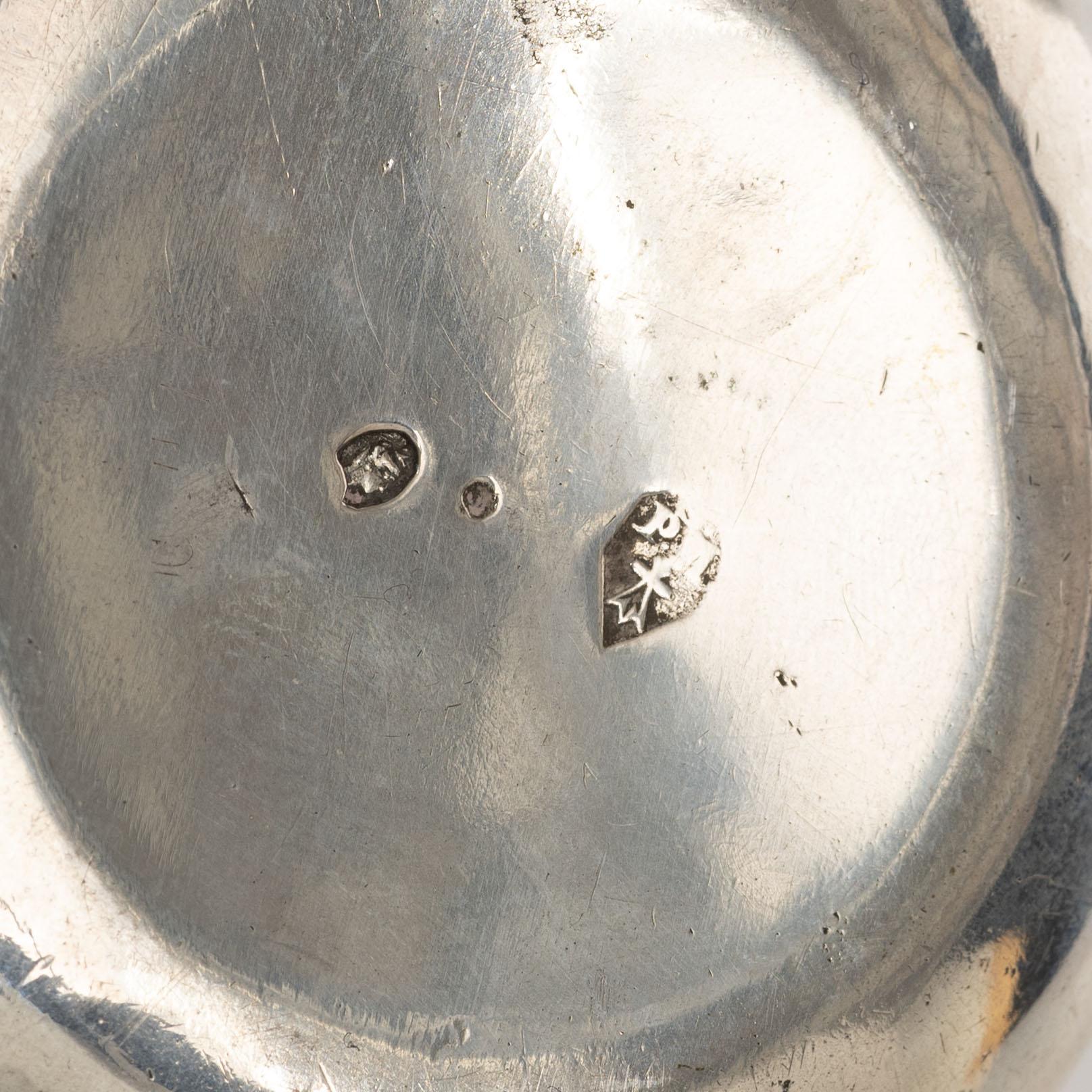 A French silver tastevin, mid-19th Century.