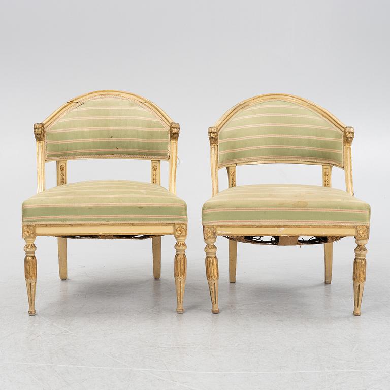 A matched pair of Gustavian style armchairs. One from around the year 1800 and one from around the year 1900.