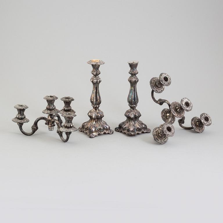 A first half of the 20th century pair of silver candelabras.