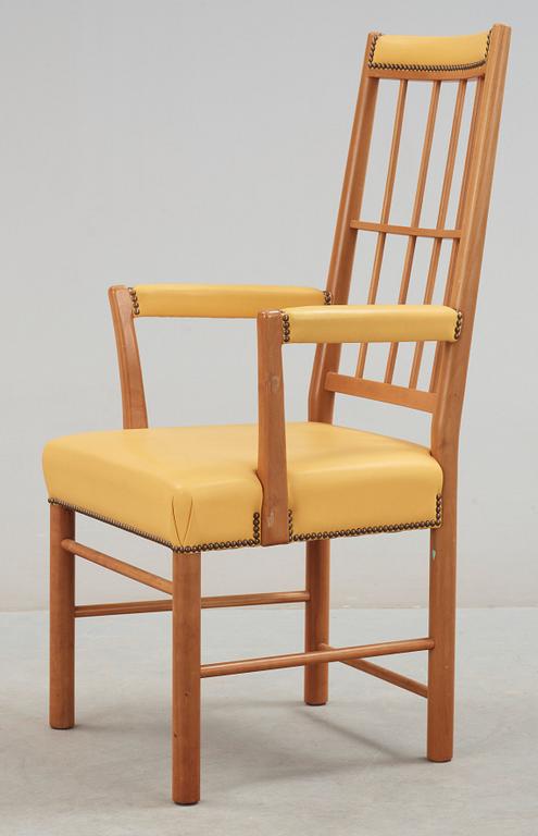 A Josef Frank cherry and yellow leather armchair, Svenskt Tenn, model 652.