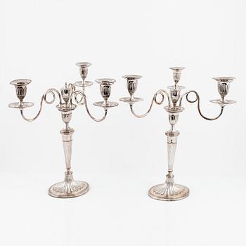 A pair of silver plated candelabra/candlesticks, England, first half of the 20th Century.