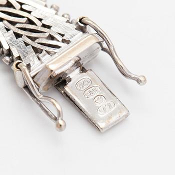 A 14K whitegold bracelet, Finnish importmarks Turun Kultaseppä Oy 1974.