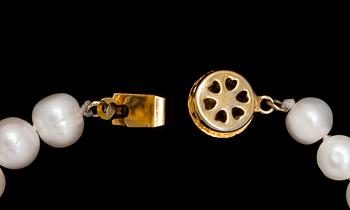 ARMBAND, odlade pärlor, lås i metall. 1900/2000-tal.