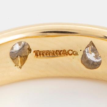 A Tiffany & Co 18K gold and platinum and brilliant-cut diamond ring.