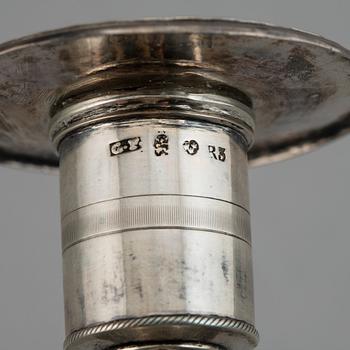 A pair of Empire silver candle sticks, 1823.