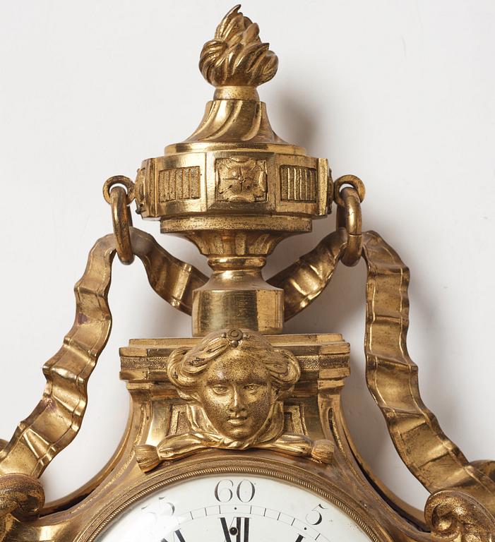 A Louis XVI wall clock, Le Roux Paris, late 18th century.