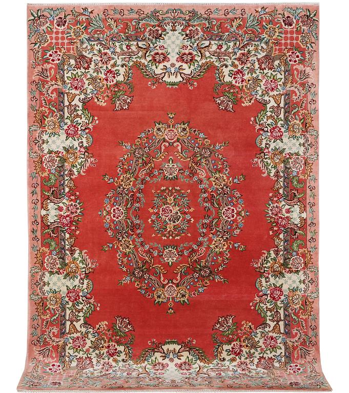 A carpet, Tabriz, c. 410 x 199 cm.