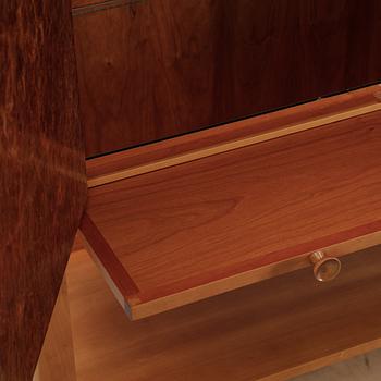 A model 2135 cabinet by Josef Frank for Firma Svenskt Tenn.