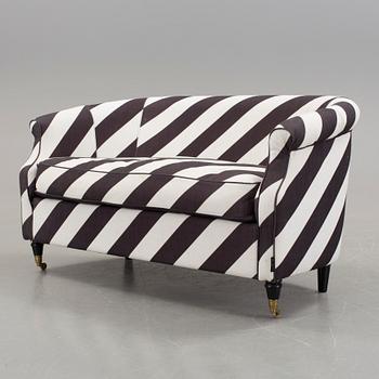 A black and white striped sofa by Rosenhof Art Factory, 21st century.
