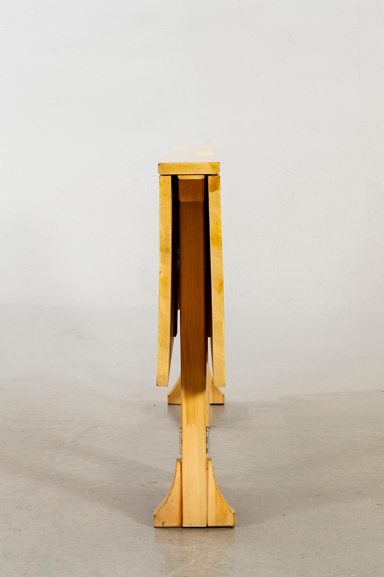 A pine wood gated leg table, design by Olof Pira "Sold Form".