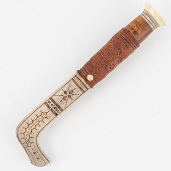 Lars Levi Sunna, a reindeer horn knife, signed.